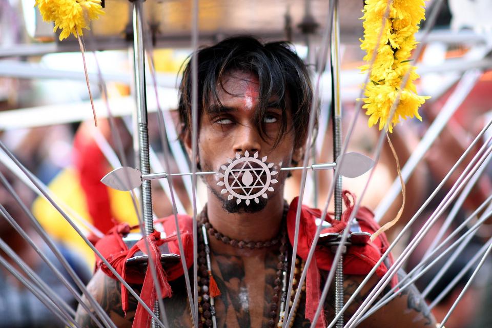 Induced Trance Worshipper at Thaipusam Festival